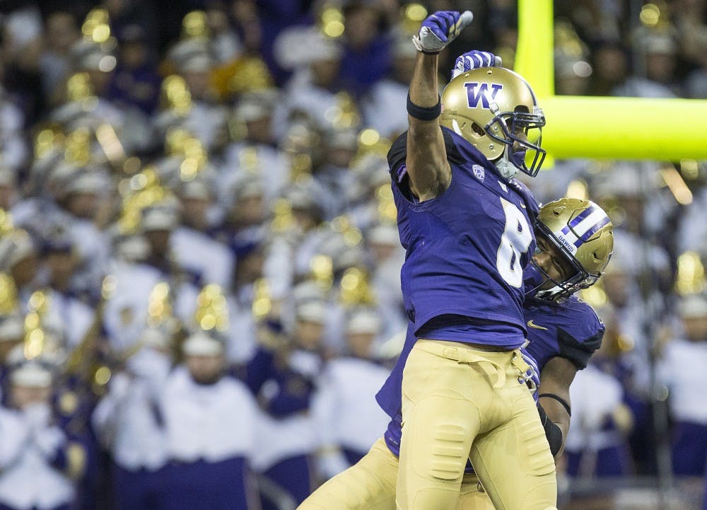 UW players celebrate after a touchdown during a football game against the ASU on Saturday, Nov. 19, 2016, in Husky Stadium in Seattle, Washington. 