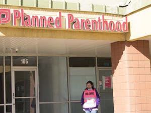 Pro-Choice Volunteer showing her support outside of Planned Parenthood on Apache Blvd Saturday Jan. 21, 2017