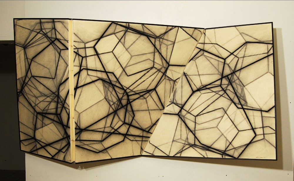 Bi-fold XII, charcoal on paper, mounted to silk, foam core and wood. (Photo courtesy of Mark Pomilio)