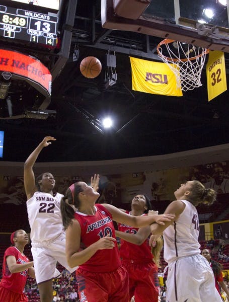 Redshirt senior forward Janae Fulcher throws up a hook shot against UA on Feb. 24. The ASU women's basketball finished off a season sweep of the Wildcats Sunday. (Photo by Ana Ramirez)