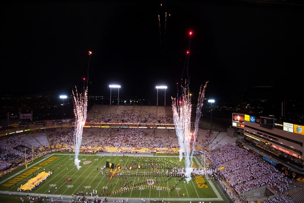 The ASU marching band welcomes the football team to the field before a game against New Mexico on Friday, Sept. 18, 2015, at Sun Devil Stadium in Tempe.