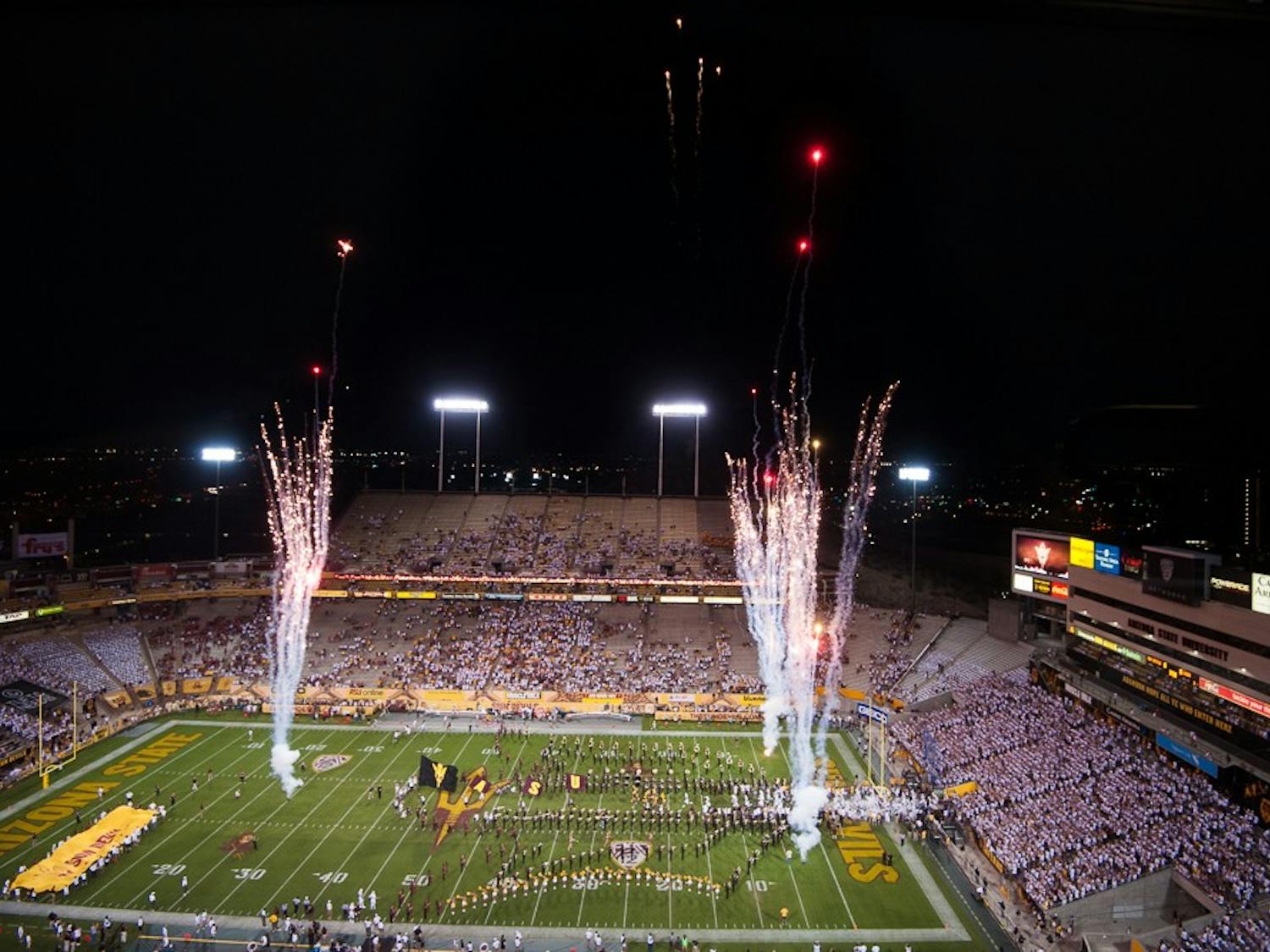 The ASU marching band welcomes the football team to the field before a game against New Mexico on Friday, Sept. 18, 2015, at Sun Devil Stadium in Tempe.