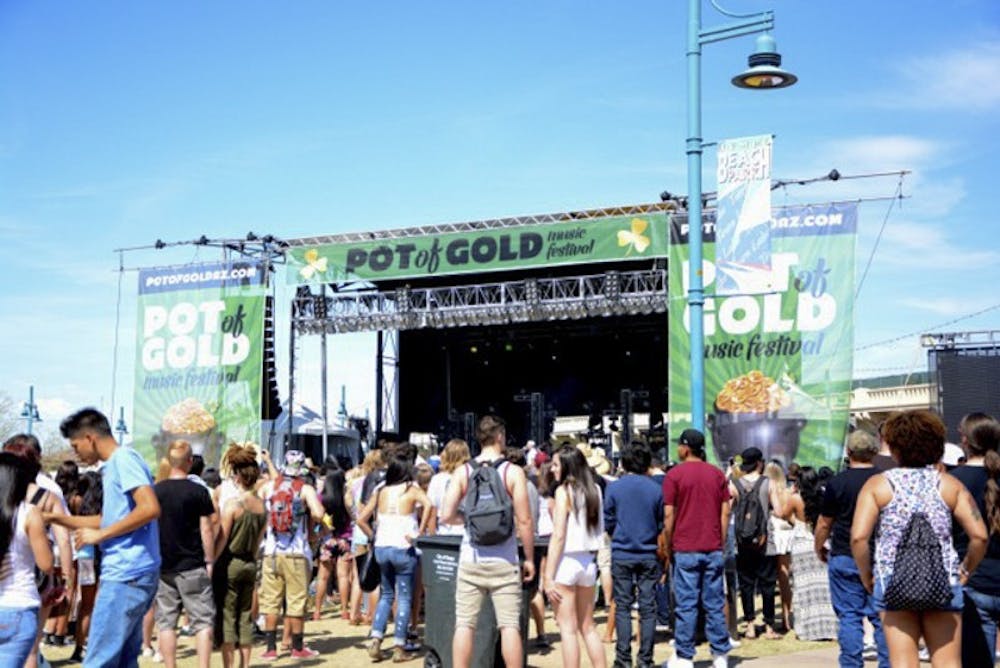 Pot of Gold fans stand in front of the second stage to listen to Boston duo, Aer on March 14, 2015 at Tempe Beach Park. (Ryan Santistevan/ The State Press)