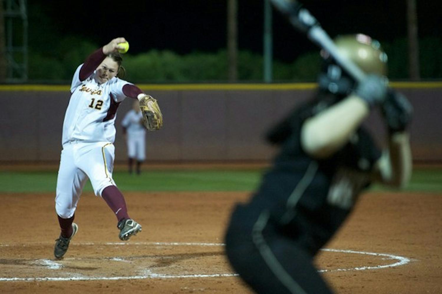 Pac-10 Award Sweep: ASU freshman pitcher Dallas Escobedo pushes off the rubber during the Sun Devils’ game against Western Michigan on Feb. 10 in Tempe. Escobedo and teammate Kaylyn Castillo both won Pac-10 awards for their play in the Sun Devils’ sweep over UA. (Photo by Michael Arellano)