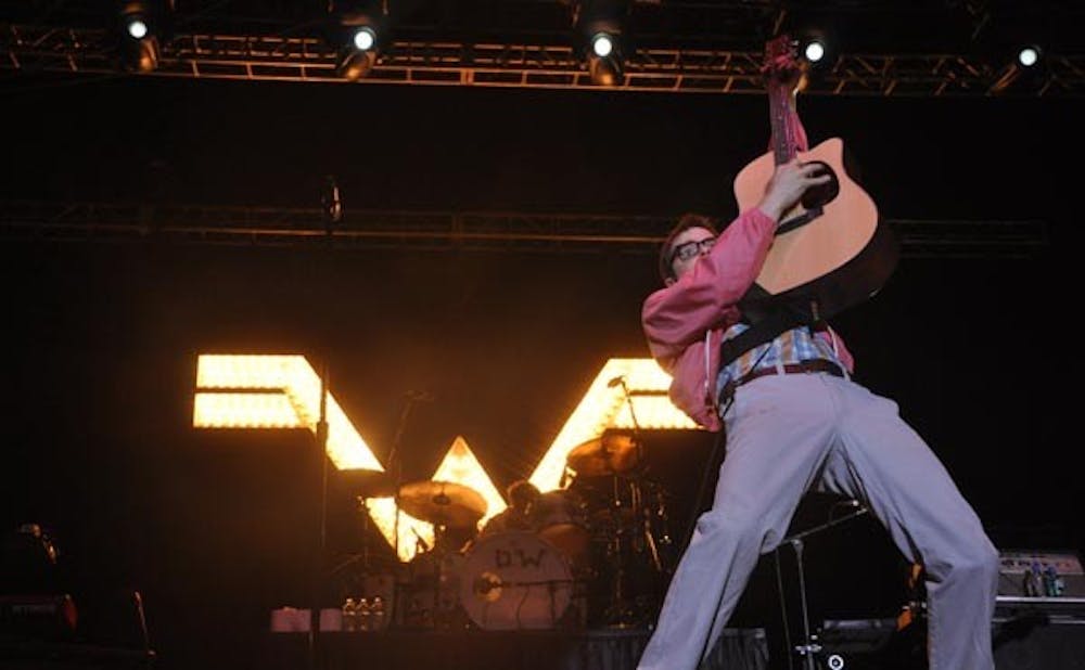 AIR GUITAR: Weezer front man, Rivers Cuomos, rocks out during the band's set at Arizona Fall Frenzy Saturday. (Photo Courtesy of Lauren Jordan)