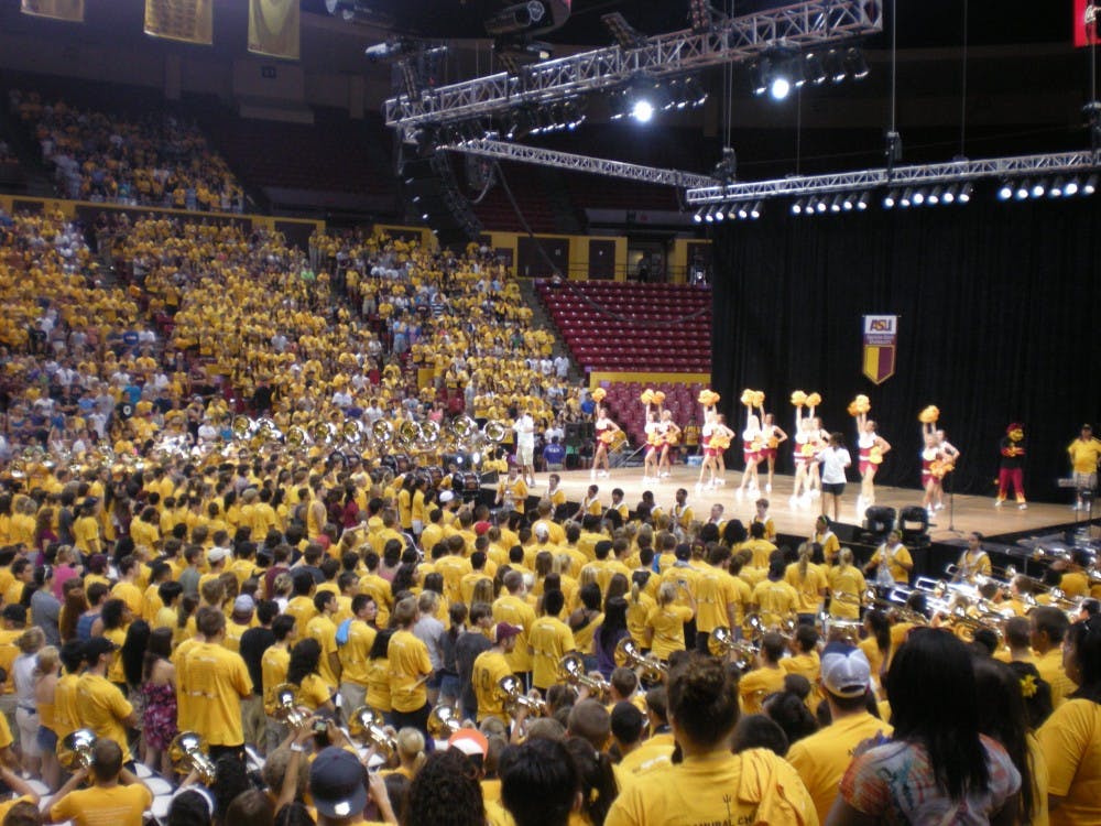 ASU students come together sporting their gold. Photo by Brendan Capria. 