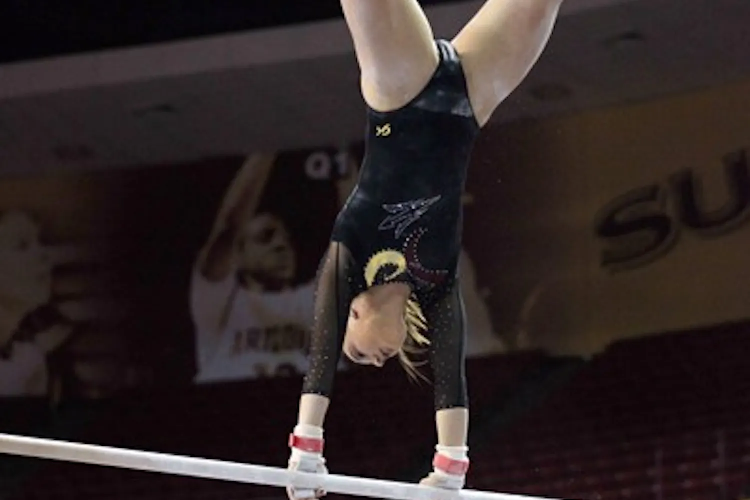 Samantha Seaman performs on the uneven bars in a meet against Cal on Jan. 20. Seaman and the Sun Devils finished their season with a fourth-place finish at the NCAA regionals. (Photo by Beth Easterbrook)