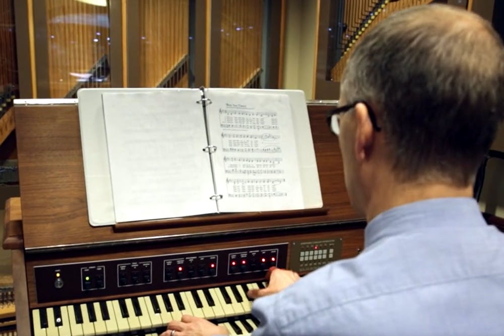 Brendan H. Connor, ASU assistant professor of Transborder Studies and student carrillonneur, plays the carillon in the basement of Old Main at the ASU Tempe campus.