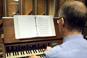 Brendan H. Connor, ASU assistant professor of Transborder Studies and student carrillonneur, plays the carillon in the basement of Old Main at the ASU Tempe campus.