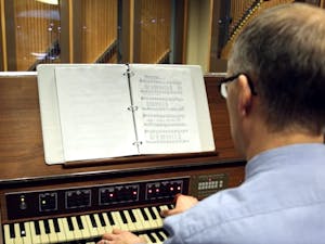 Brendan H. Connor, ASU assistant professor of Transborder Studies and student carrillonneur, plays the carillon in the basement of Old Main at the ASU Tempe campus.