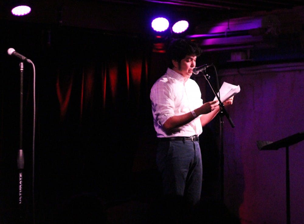 Urian Garcia, Creative Writing student at ASU, reads his short fiction piece at the Spillers 7th annual event at the Valley Bar on Tuesday, March 14, 2017. 