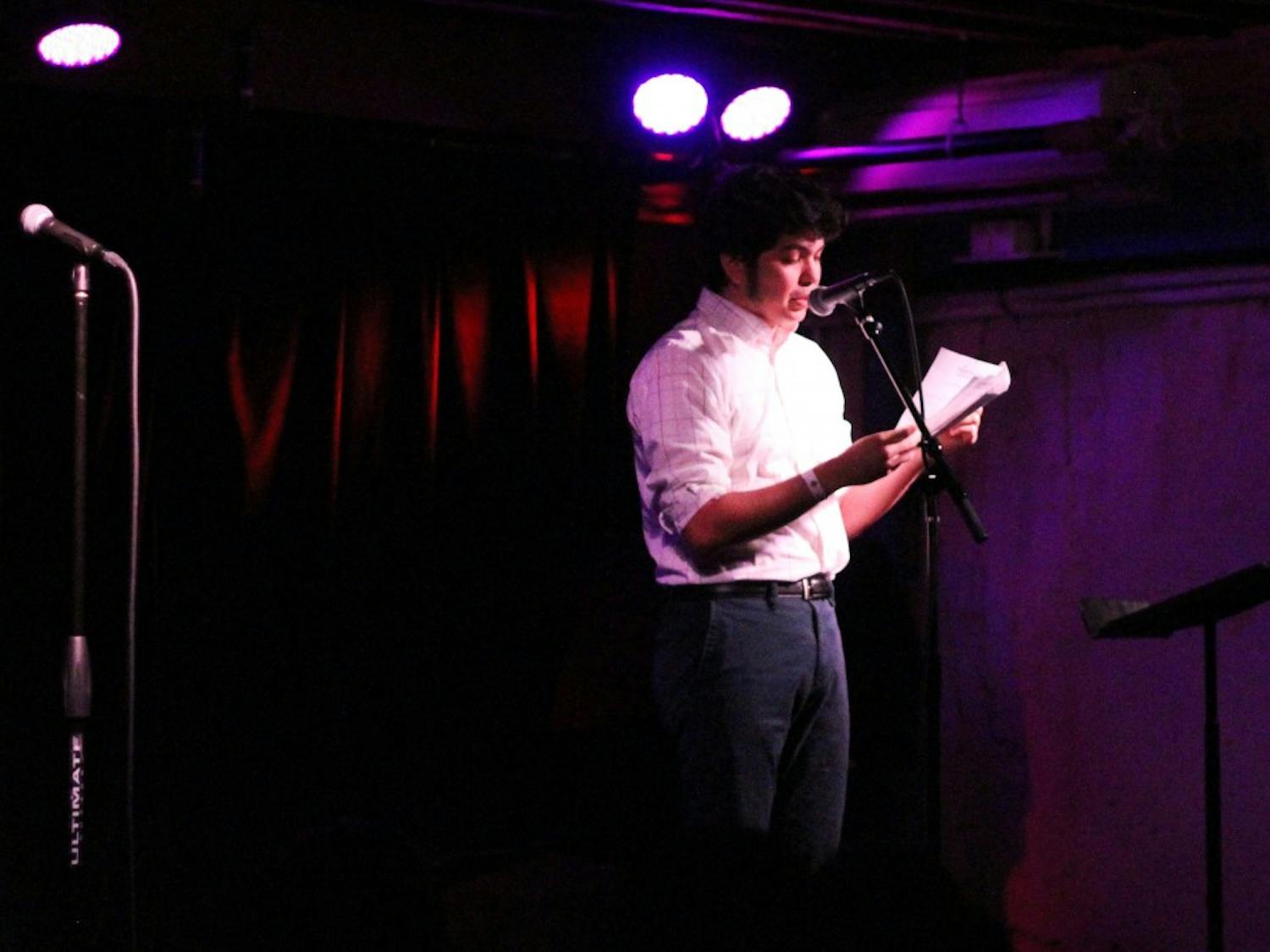 Urian Garcia, Creative Writing student at ASU, reads his short fiction piece at the Spillers 7th annual event at the Valley Bar on Tuesday, March 14, 2017. 