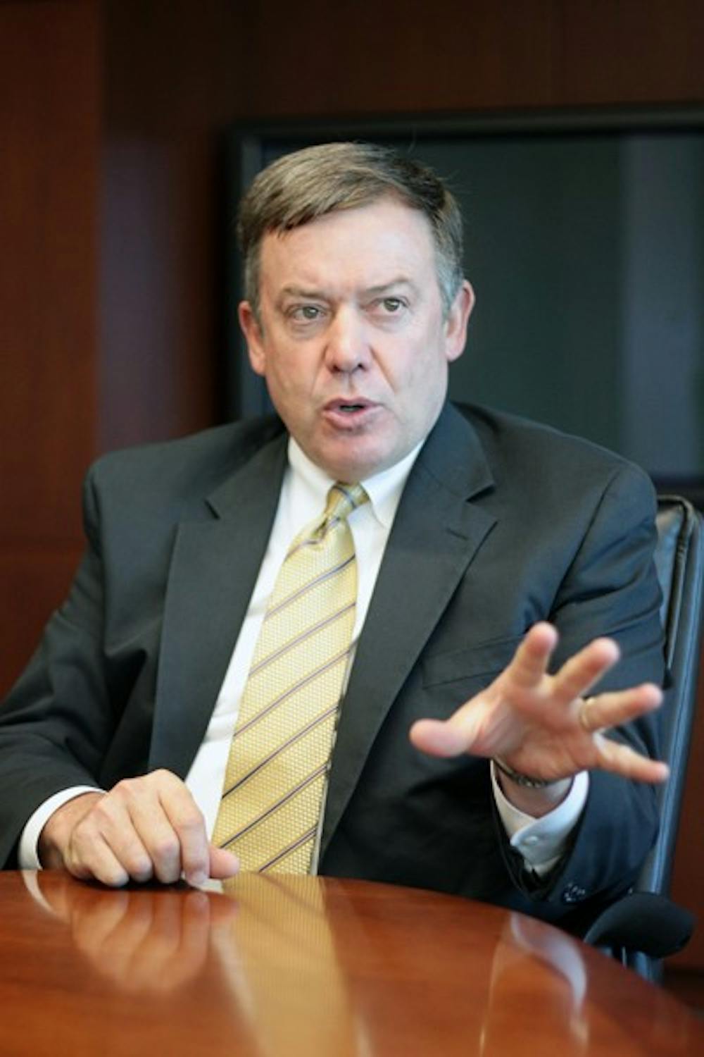 University President Michael Crow speaks to The State Press editorial board Oct. 11, 2011. President Crow recently released proposed tuition increase percentages. (Photo by Beth Easterbrook)