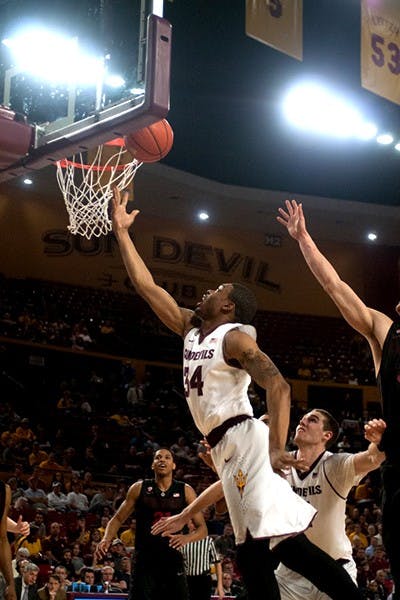 Senior guard Jermaine Marshall scores a lay up in a match against Stanford on Feb. 26. (Photo by Mario Mendez)