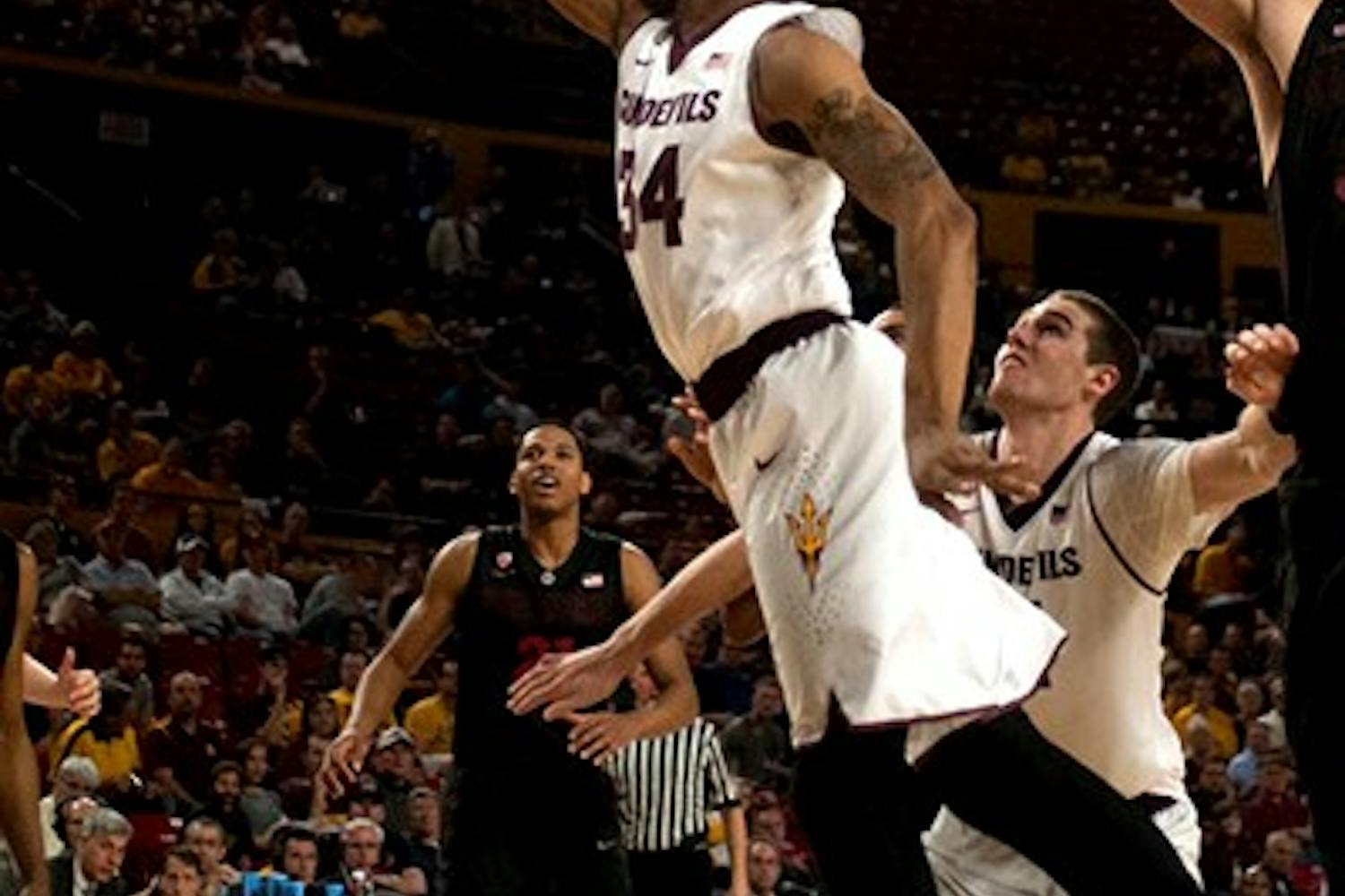 Senior guard Jermaine Marshall scores a lay up in a match against Stanford on Feb. 26. (Photo by Mario Mendez)