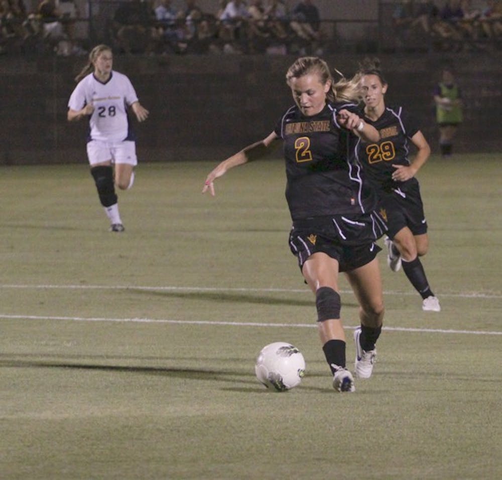 OUTRUNNING THE ‘JACKS: Freshman forward Alexandra Doller works with the ball inside NAU’s penalty area during the Sun Devils 7-0 win on Friday. Doller scored twice in her college debut. (Photo by Elijah Grasser)