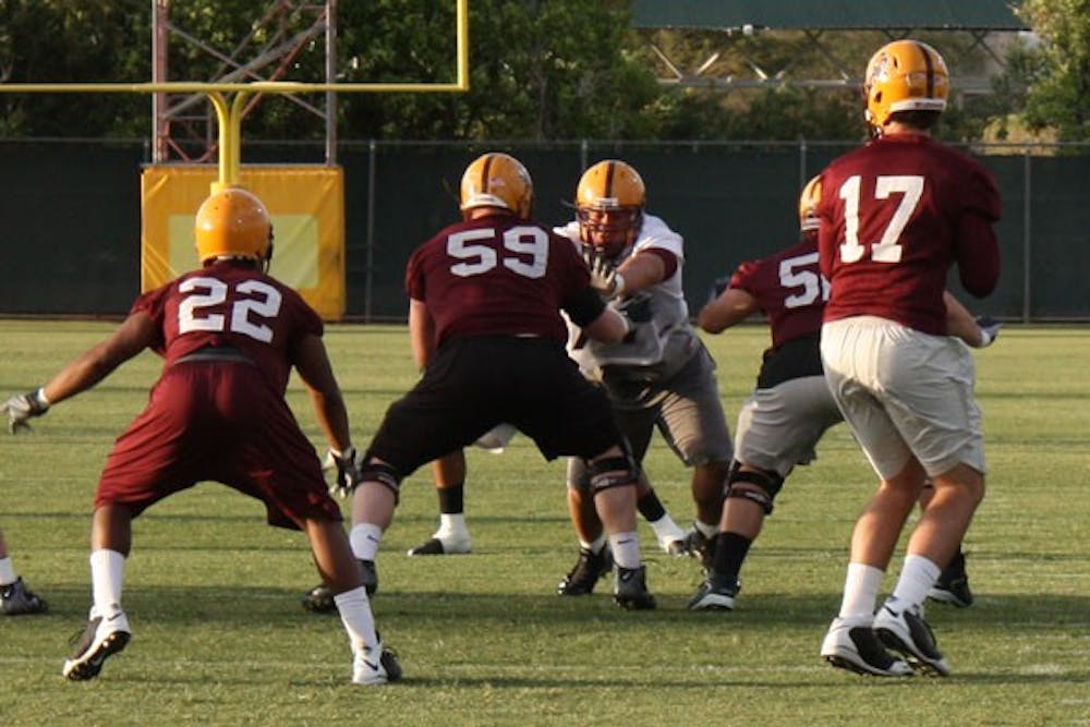 TOUGH BREAK: ASU senior offensive lineman Jon Hargis (No. 59) tore his anterior cruciate ligament  during the Sun Devils' scrimmage on Saturday, putting his 2010 season in doubt. (Photo by Kyle Thompson)