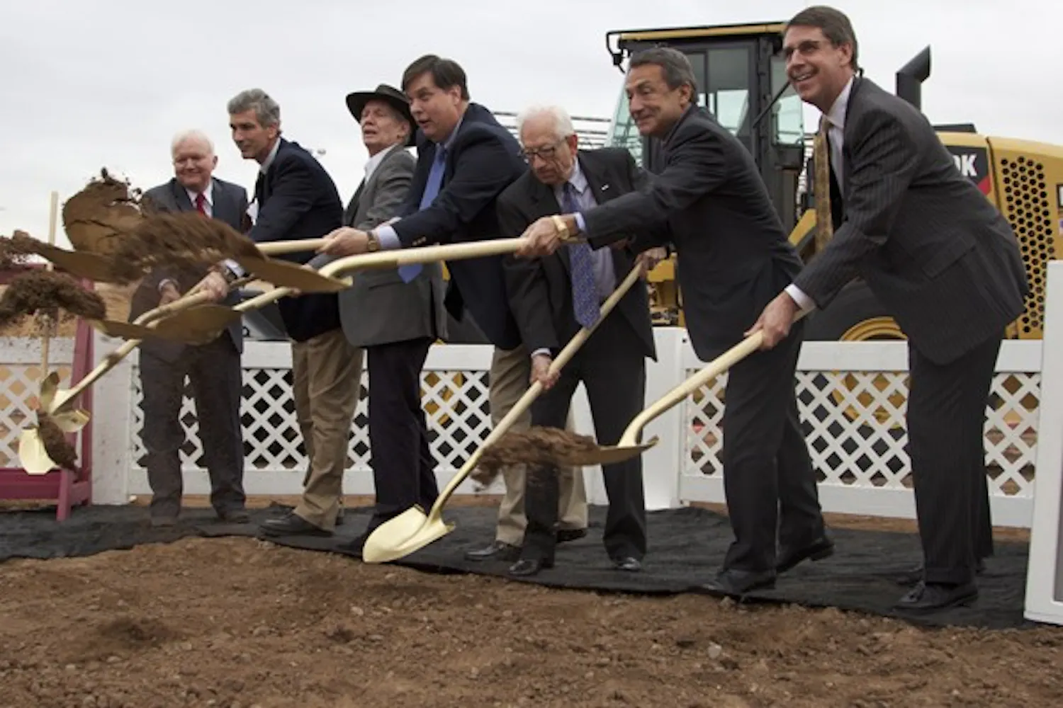 Developers for Block 12 throw dirt with golden shovels as part of a breaking ground ceremony for the new building on Jan. 24 in Tempe. The building will be five stories tall and cost 54.5 million dollards. (Photo by Ana Ramirez)
