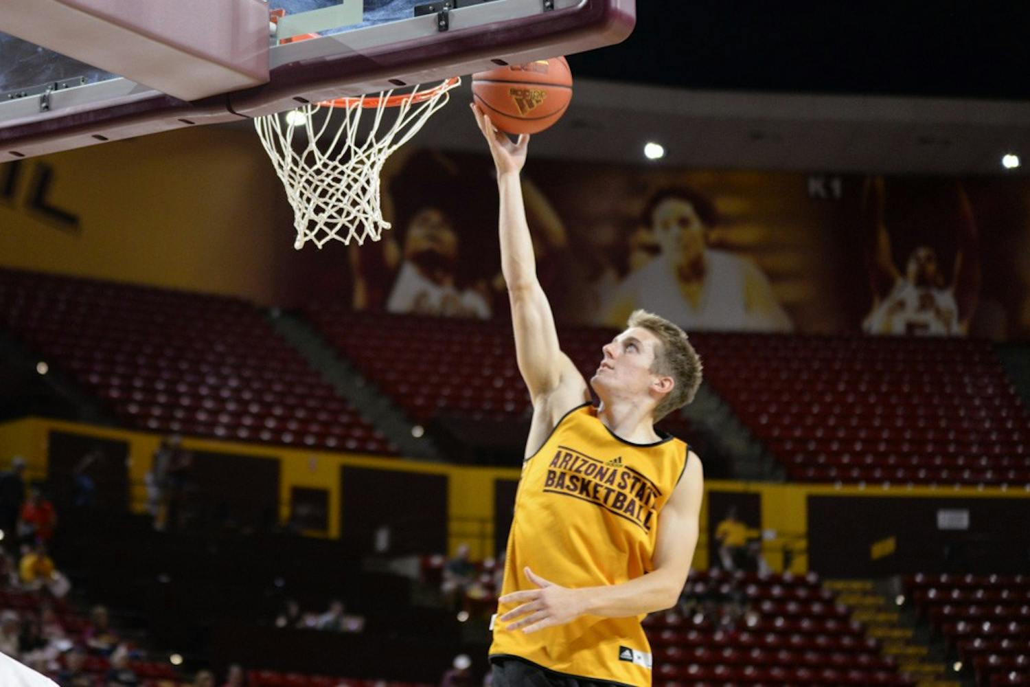 Sophomore guard Austin Withereill takes the ball to the hoop during the men's intra-squad scrimmage on Friday, Oct. 9, 2015, at Wells Fargo Arena in Tempe.