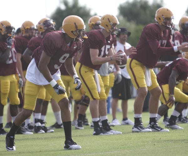 Redshirt sophomore wide receiver A.J. Pickens waits for a call from quarterbacks freshman Taylor Kelly and sophomore Brock Osweiler. (Photo by Scott Stuk)