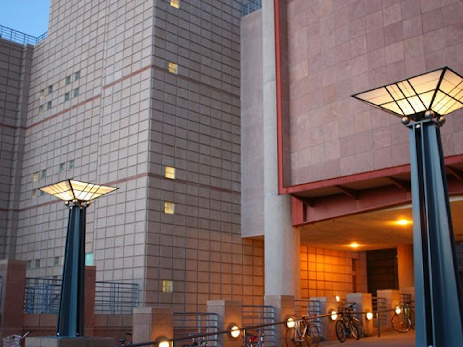 END OF THE DAY: The day is slowly fading as seen at the entrance of the College of Design. The building is rarely empty this time of year with studio finals and big projects due towards the end of the semester. (Photo by Jessica Weisel)