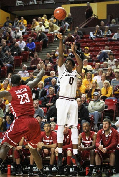 Senior wing Carrick Felix releases a jumper against Washington State on Feb. 20. Felix will be showing off his athleticism in the State Farm College Slam Dunk Championship Thursday April 11.  (Photo by Sam Rosenbaum) 