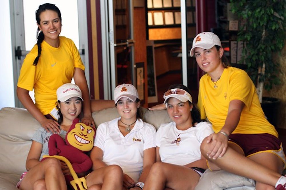 TRANSITION: Members of the ASU women’s golf team pause for a photo in the Karsten clubhouse during practice on Wednesday. The team’s nutritionist plays a large role in helping the international players eat healthy food around campus. (Photo by Lisa Bartoli)