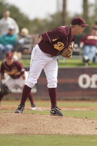 LOCKED IN: ASU junior Merrill Kelly waits for the sign from his catcher during the Sun Devils’ win over Northern Illinois last month. ASU swept all four opponents in this weekend’s Coca-Cola Classic. (Photo by Scott Stuk)