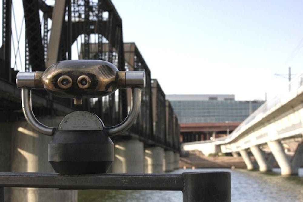 ZOOM VIEW: Visitors can view any part of Tempe Town Lake through a telescope on the west end. (Photo by Sam Rosenbaum)