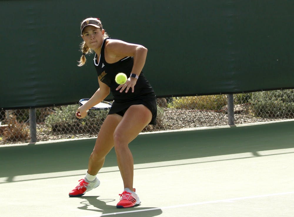 ASU senior Kassidy Jump competes in a singles match against Nevada at the Whitemans Tennis Center in Tempe, Arizone on Friday Feb. 17, 2017. 