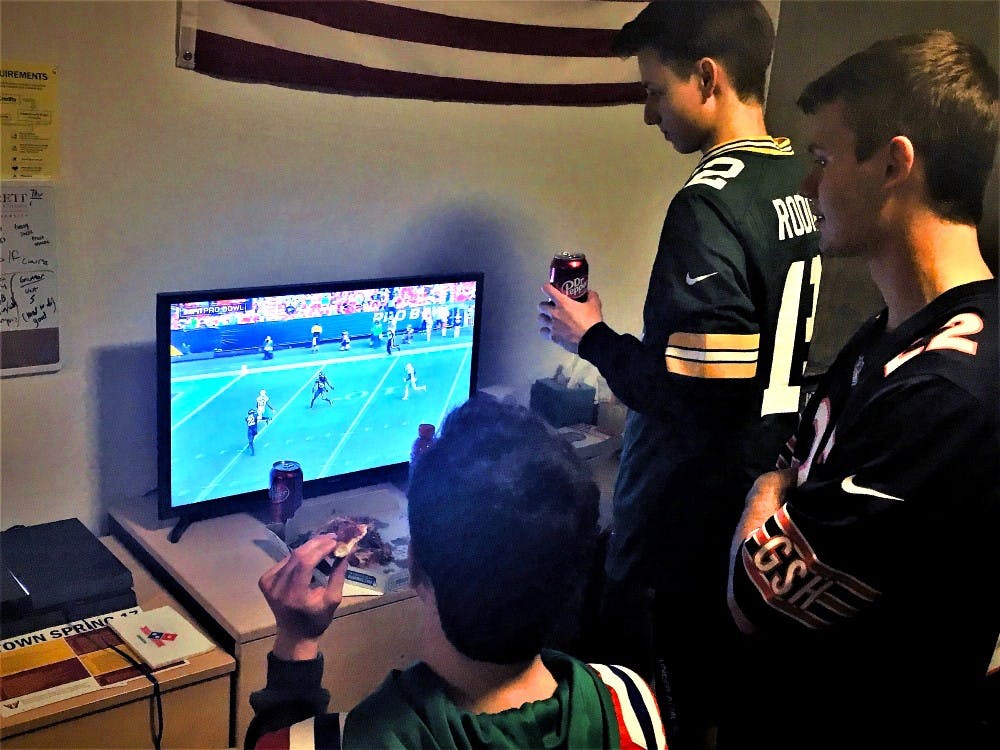 Chris Gleason, Michael Magyar and Tyler Wiese gather to watch the Pro Bowl highlights on Jan. 17, 2017 on ASU's Downtown Phoenix campus.