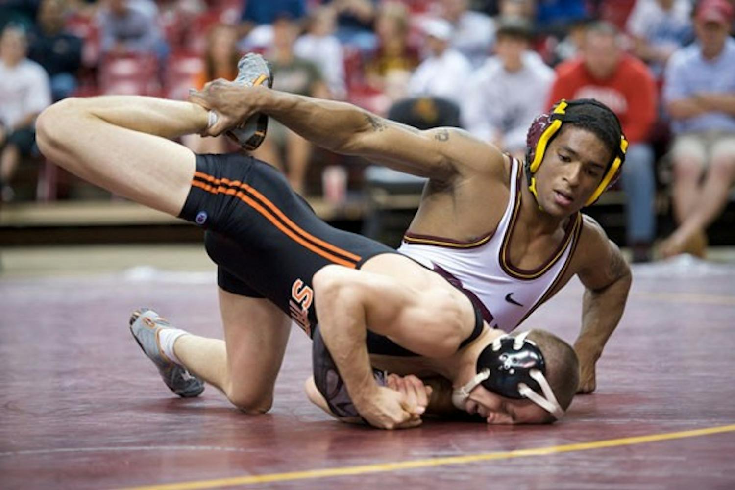 ALL-AMERICAN BOY: ASU junior Anthony Robles placed seventh at the NCAA Championships in Omaha, Neb. over the weekend, earning All-American status for the second straight year. (Photo by Michael Arellano)