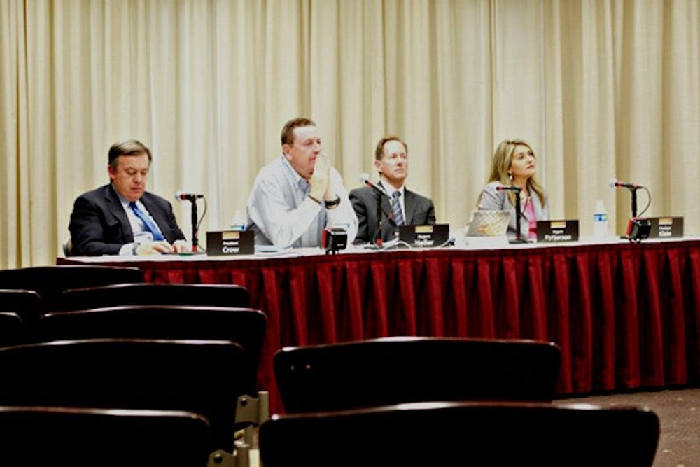 The ASU Tempe panel listens as students from other Arizona universities speak on behalf of their school's proposed tuition rates. (Photo by Taylor Bahrijczuk)