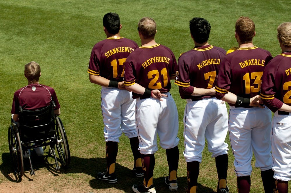 Cory Hahn (far left) is seen lining up with his fellow Sun Devils for the playing of the national anthem at a home game in Tempe. Hahn has been recently drafted by the Arizona Diamondbacks. (Photo by Molly Smith.)