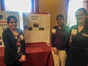 (Left to right) Megumi Sharma, Farizah Ali and Phoebe Newell pose for a photo at the Woodside Community Action Grant banquet held at Old Main on Monday, April 10, 2017. 