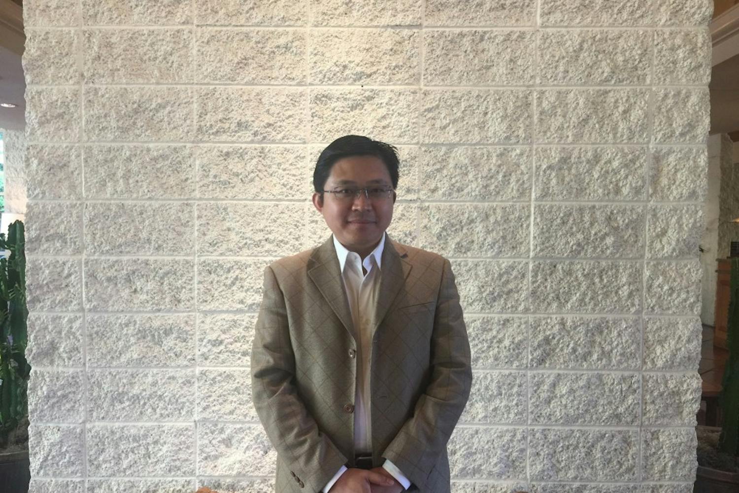 Dr. Tony Hu poses for a photo at Tempe Mission Palms on March 6, 2017