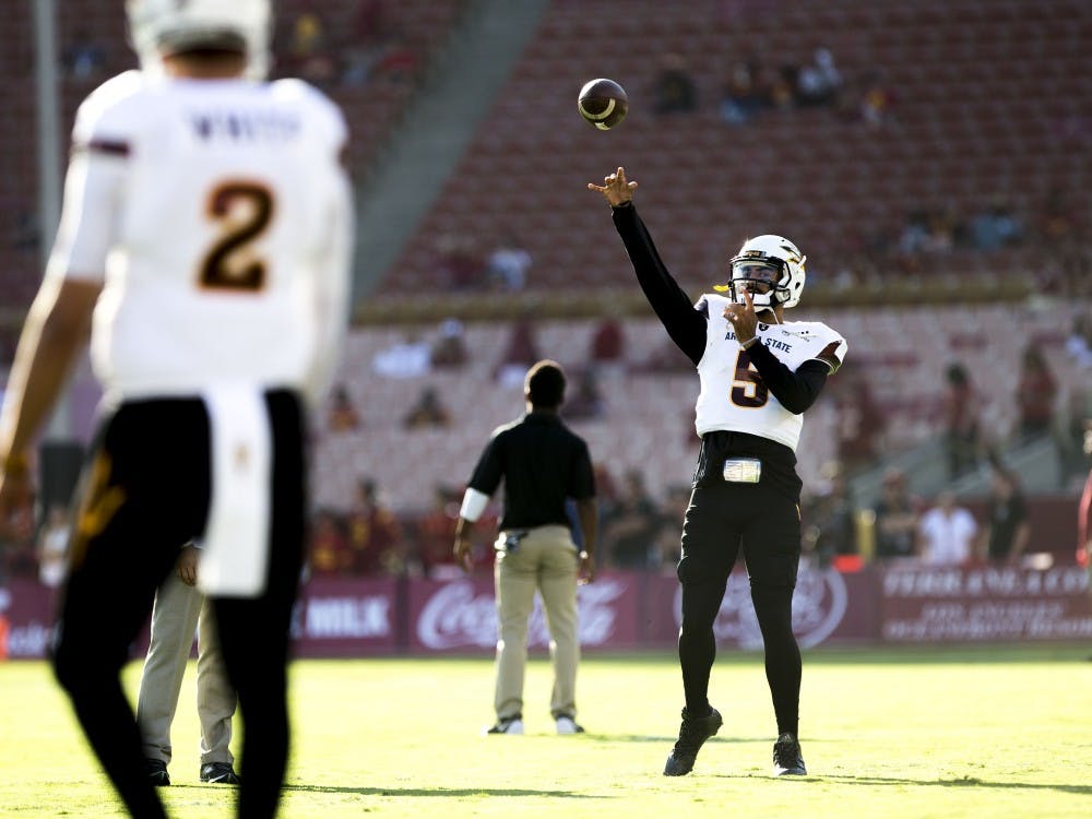Arizona State Sun Devils quarterback Manny Wilkins (5) warms up with Arizona State Sun Devils back-up quarterback Brady White (2) before a game against the USC Trojans in the Los Angeles Memorial Coliseum on Saturday, Oct. 1, 2016. 