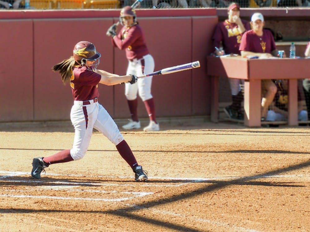 Senior third baseman Haley Steele hits a home run during the opening inning of ASU's game against Cal State Northridge February 8, 2015 at Farrington Stadium in Tempe. ASU lost 8-6. (J. Bauer-Leffler/The State Press)