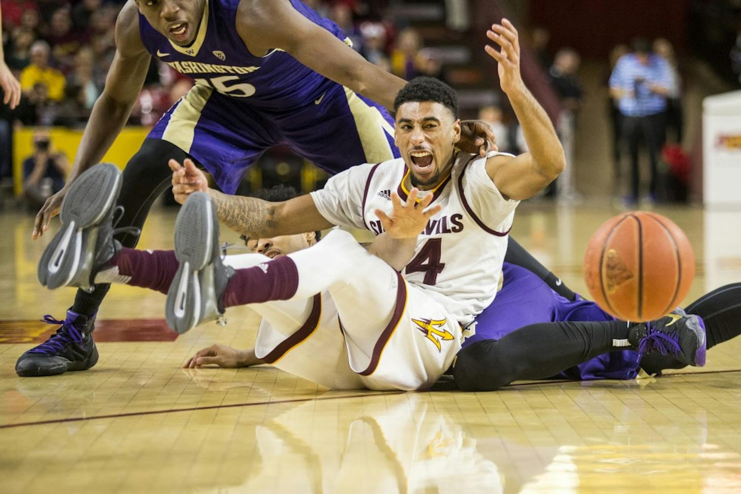 Arizona State Sun Devils guard Andre Spight (24) loses control of the ball during a game against the University of Washington Huskies in Wells Fargo Arena on Saturday, Jan. 16, 2015, in Tempe, Ariz. The Huskies won the matchup, 89-85.
