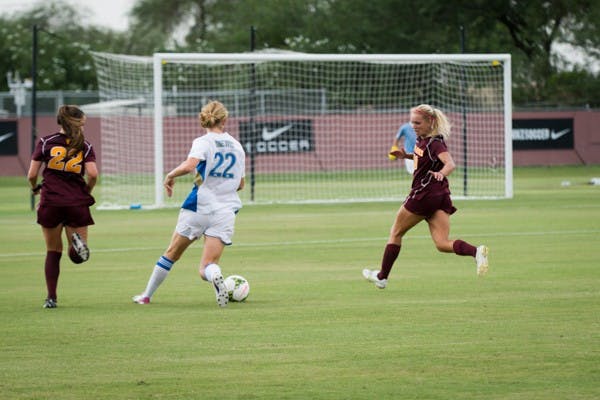 Sophomore defender Mckenzie Grossman attempts to steal the ball during the game against UCLA on Sept. 26 in Tempe. (Photo by Andrew Ybanez)
