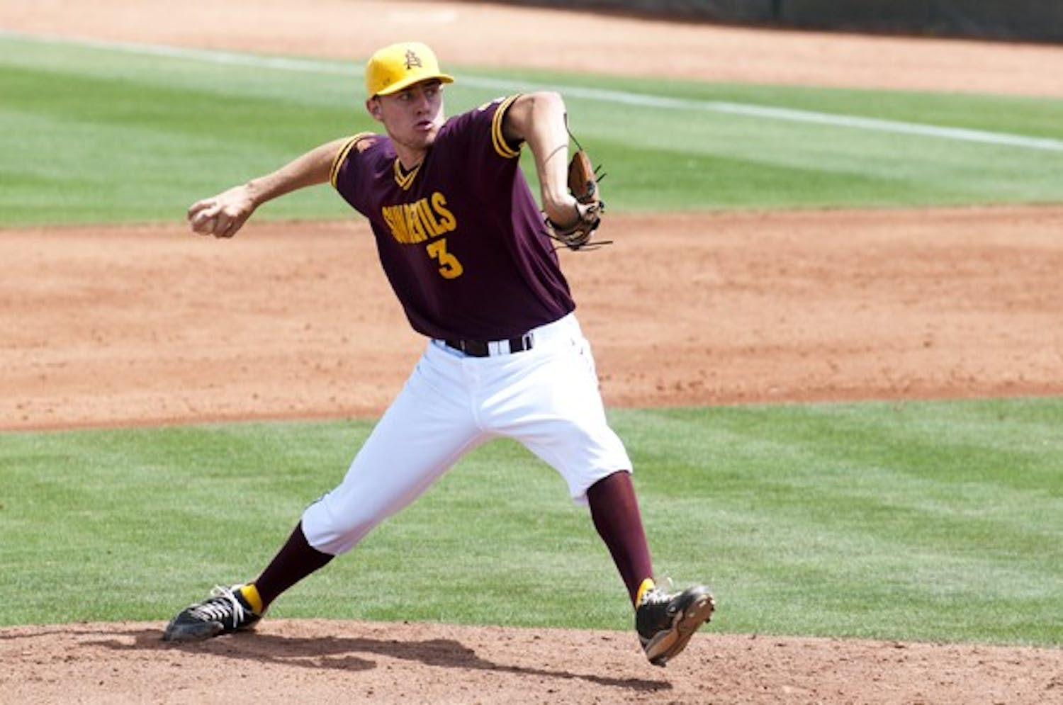 Bouncing Back: ASU sophomore Jake Barrett drives off the rubber during the Sun Devils’ 3-1 victory over Oregon on April 2. ASU, after getting swept by Oregon State, returns home looking to turn things around against UW. (Photo by Michael Arellano)