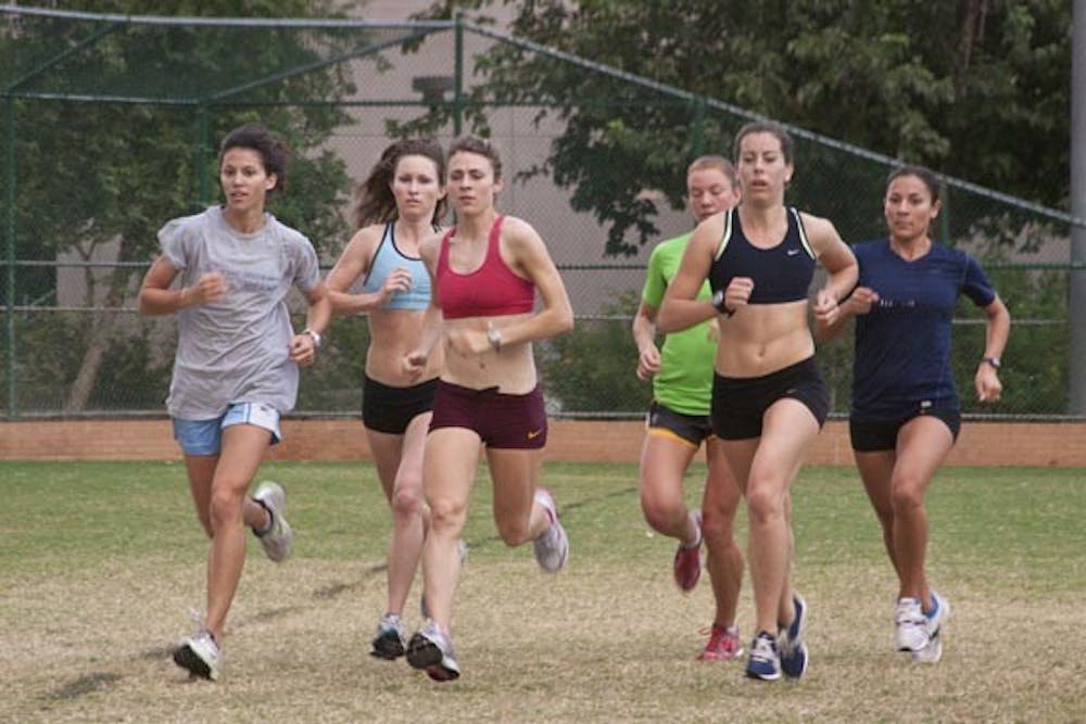 BIG RUN AHEAD: Members of the ASU women’s cross country team run together at practice last week. Both the women’s and men’s teams match up with elite competition this weekend at the Pac-10 Championships in Seattle. (Photo by Annie Wechter)