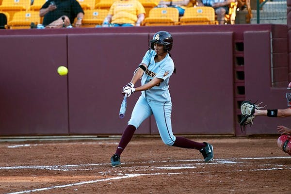 Junior third baseman Haley Steele makes contact with the ball in a match against Boston College on Feb. 22. (Photo by Mario Mendez) 