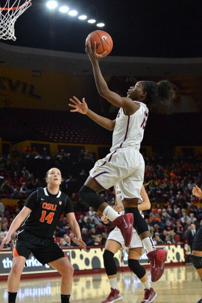 Junior guard Promise Amukamara attempts a layup in the final moments against OSU. Amukamara made 4 steals in the second half lending to a comeback and eventual win for ASU, 64-62.