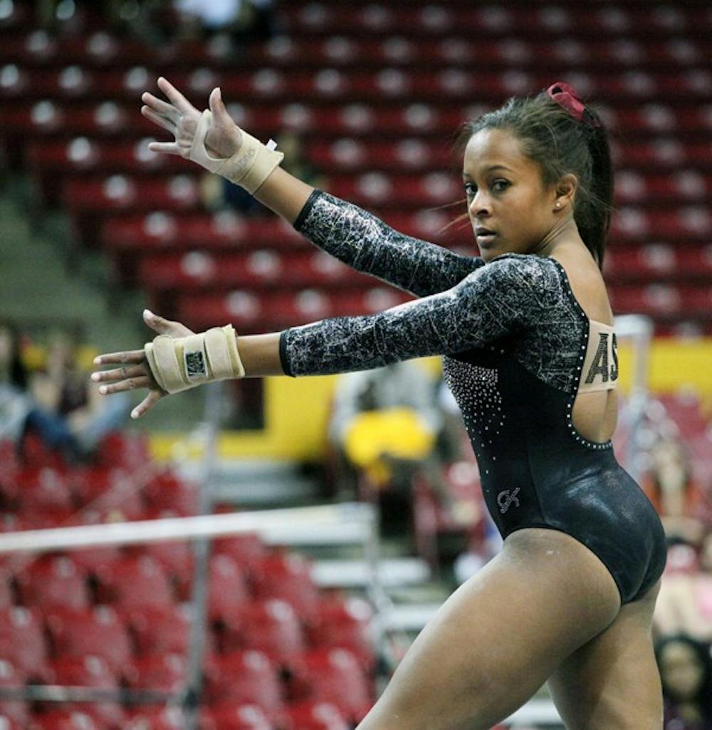 Beaté Jones performs a floor routine in a meet against Utah on Feb. 12. After redshirting her junior year, Jones is enjoying her final season in Tempe as the leader of the Gym Devils. (Photo by Beth Easterbrook)