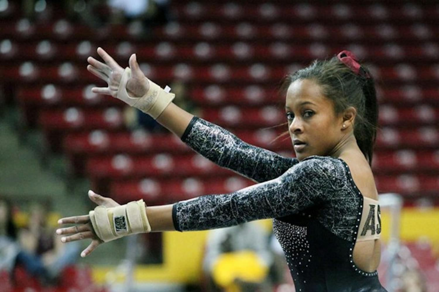 Beaté Jones performs a floor routine in a meet against Utah on Feb. 12. After redshirting her junior year, Jones is enjoying her final season in Tempe as the leader of the Gym Devils. (Photo by Beth Easterbrook)