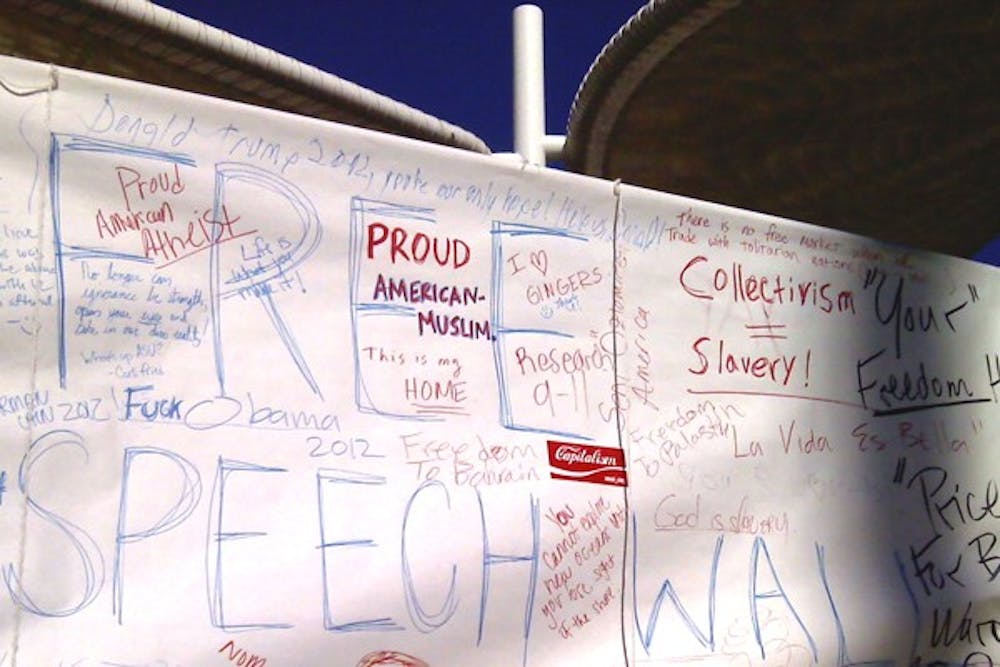 Students for Liberty hosted a free speech event on Monday and Tuesday at the Memorial Union by posting a Free Speech Wall made of paper for students and faculty to write down any thoughts or opinions. (Photo by Shawn Raymundo)