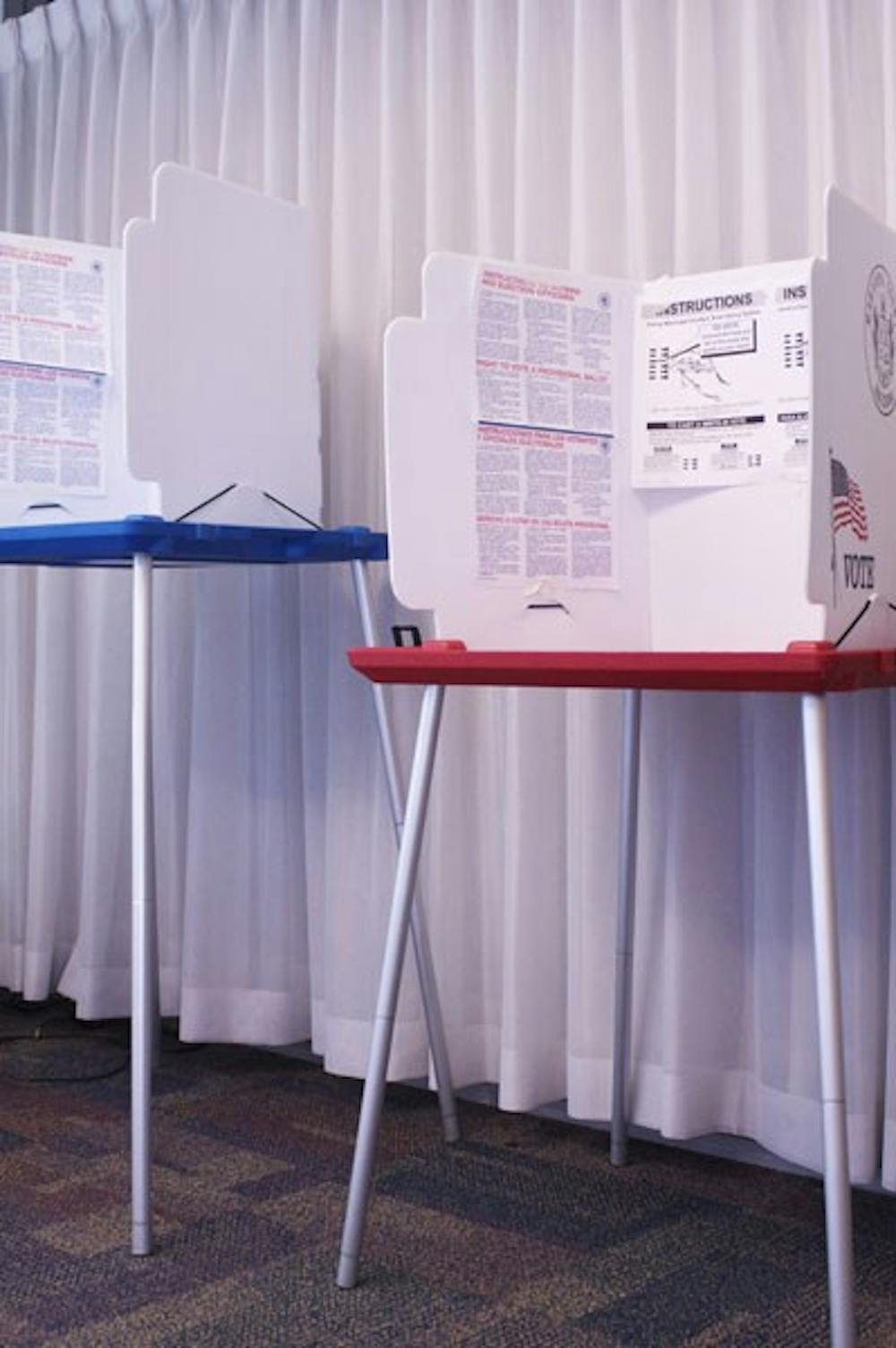 VOTING CONCERNS: Chances are these poll boxes at the ASU polling location in Palo Verde West Resident's Hall will remain empty. Workers say they only have had 15 voters in three weeks. (Photo by Scott Stuk)