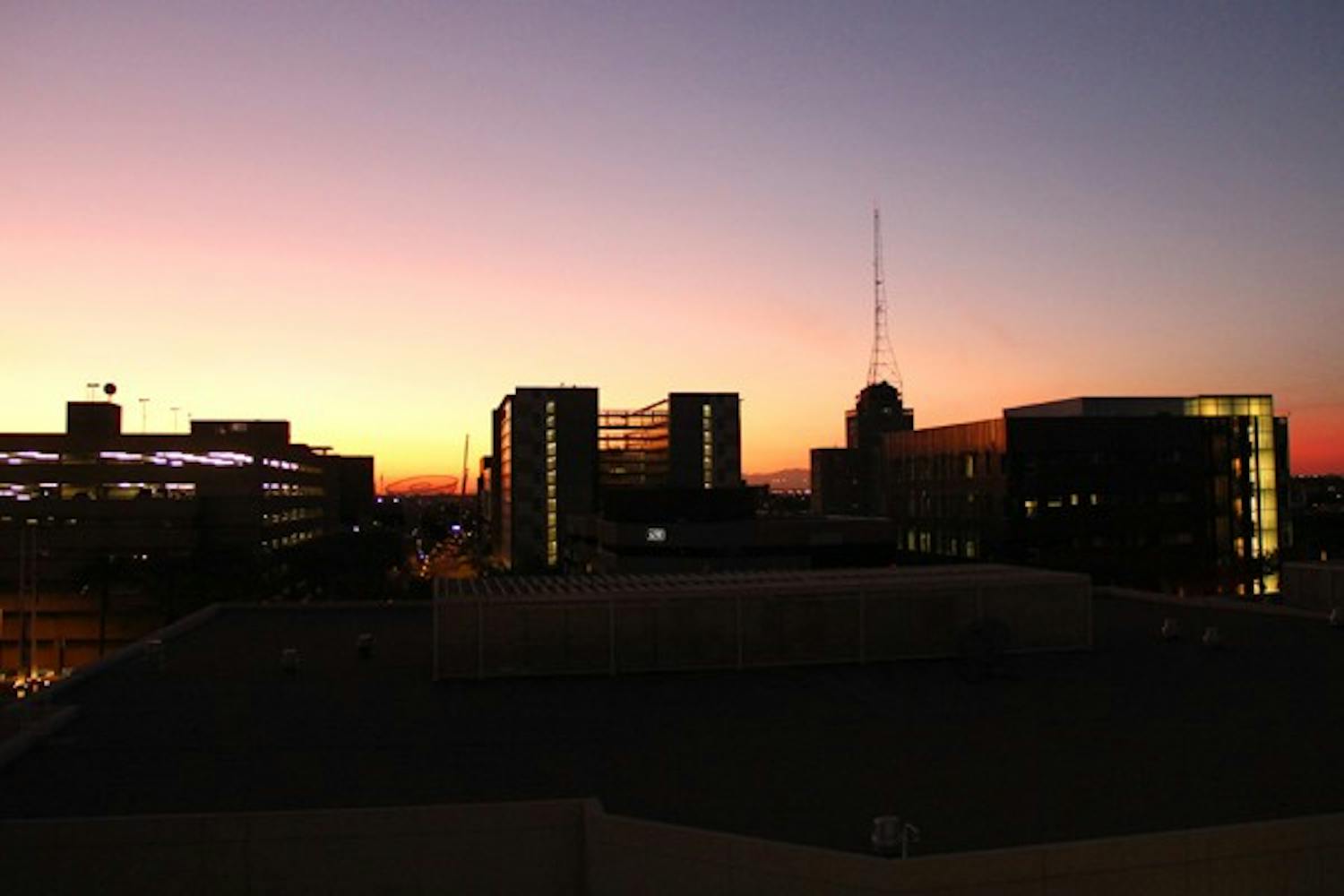 The ASU Downtown campus is silhouetted during sunset Wednesday evening. (Photo by Diana Lustig)