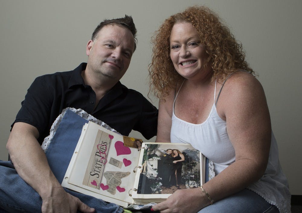 Louis and Jennifer Velasco pose for a portrait on Thursday Oct. 15, 2015, inside the Main Chapel at the Newman Center in Tempe. The Velascos were married in the Old Chapel of the Newman Center and celebrate their 21st anniversary in November.